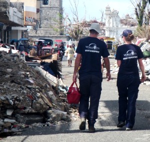 World Vets Disaster Responders, Dr. Springer Browne and Dr. Helle Hydeskov, walk through Guiuan providing veterinary care and performing an initial assessment of veterinary needs.