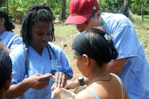 World Vets volunteers vaccinating for rabies during community outreach clinic; Nicaragua